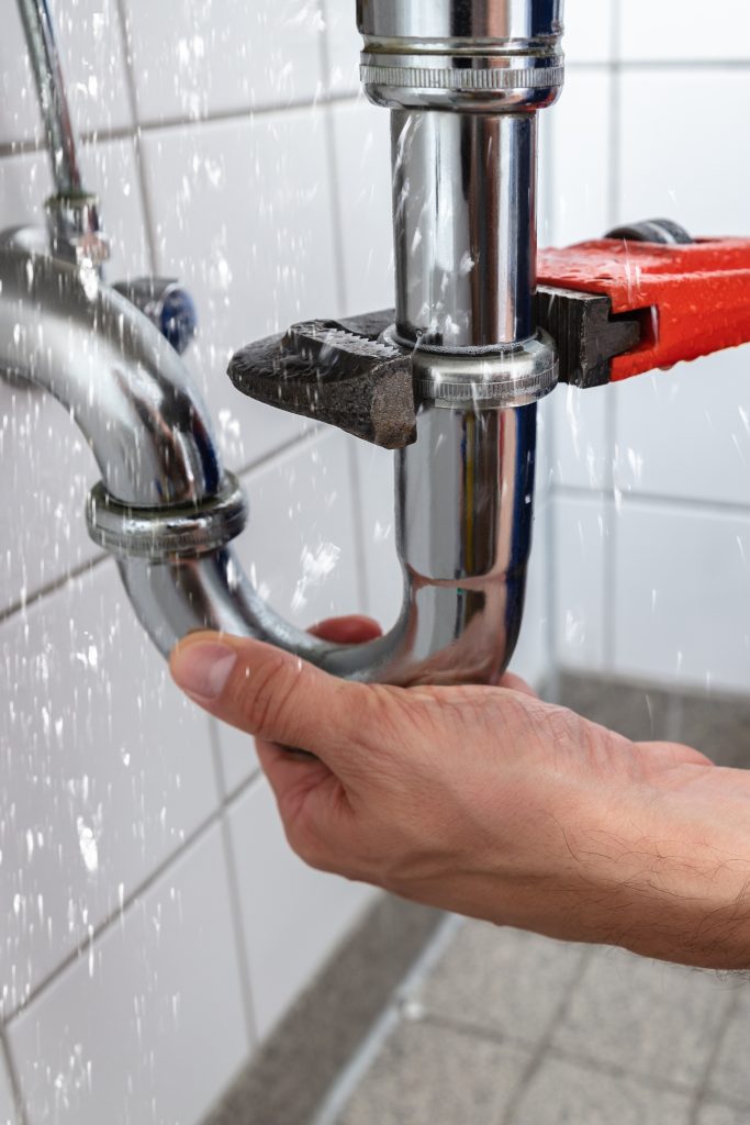 Plumber,repairing,pipe,water,leak.,fixing,plumbing